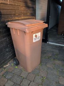 Brown wheelie bin