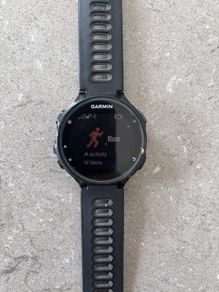 Garmin Forerunner 735XT GPS Multisport Watch and USB cable charger