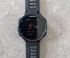 Garmin Forerunner 735XT GPS Multisport Watch and USB cable charger
