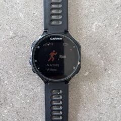 Garmin Forerunner 735XT GPS Multisport Watch and USB cable charger