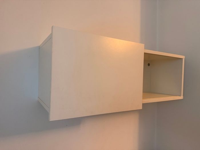 IKEA wall shelf with sliding door