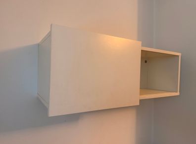 IKEA wall shelf with sliding door