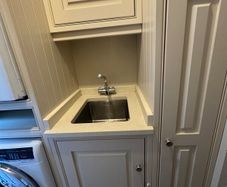 Inframe utility units, quartz surround with sink