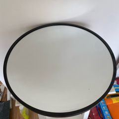 Round black mirror