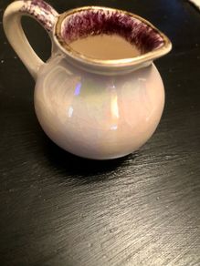 Old glazed creamer jug