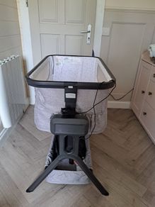 Electronic glide bedside crib by Baby Elegance