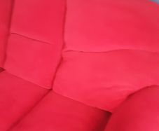 Large dark pink sofa immaculate condition size 80inchs long