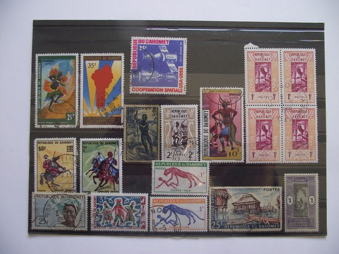 The collection of old stamps from French colonies on stock cards