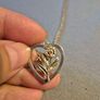 Vintage Sterling Silver Meadow Flowers in a Heart. Stamped. Image 2