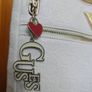 GUESS White Embossed Monogram Crossbody Bag Image 5