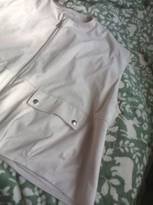 Beige sleeveless jacket