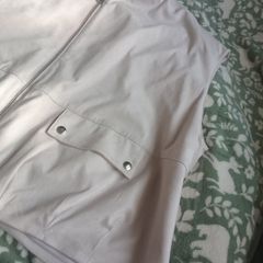 Beige sleeveless jacket