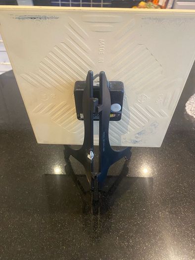 Blue tile clock with windmill
