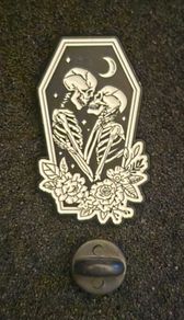 Skeletons , pin back badge.