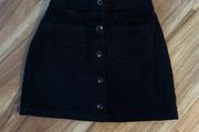 Next black corduroy skirt age 7 excellent condition worn once!