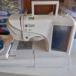 like new embroidery sewing machine
