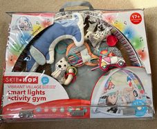 Colourful baby activity gym with music and toys