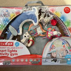 Colourful baby activity gym with music and toys