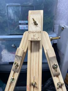 Crawford and black artist easel