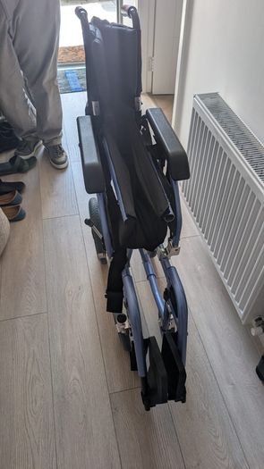 Folding wheelchair, excellent condition
