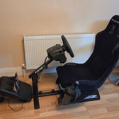 Playseat racing rig with Logitech G29 steering wheel and shifter