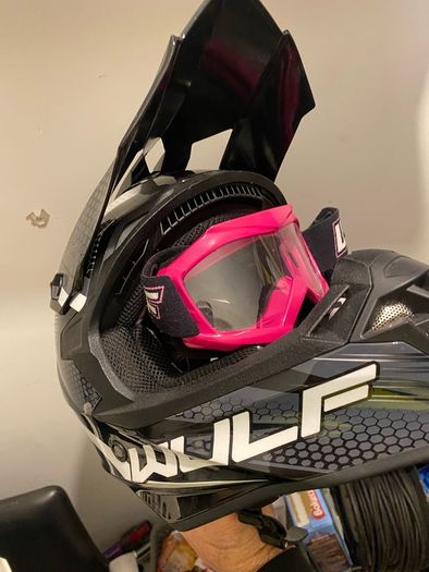 motocross helmet , gloves , goggles