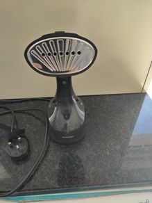Hand held steamer