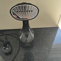 Hand held steamer