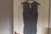 Sleeveless cardi with two patch pockets. Bought at carriage Donna.