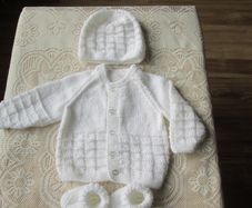 Hand Knitted Baby's Cardigan's, Hat &  bootie's