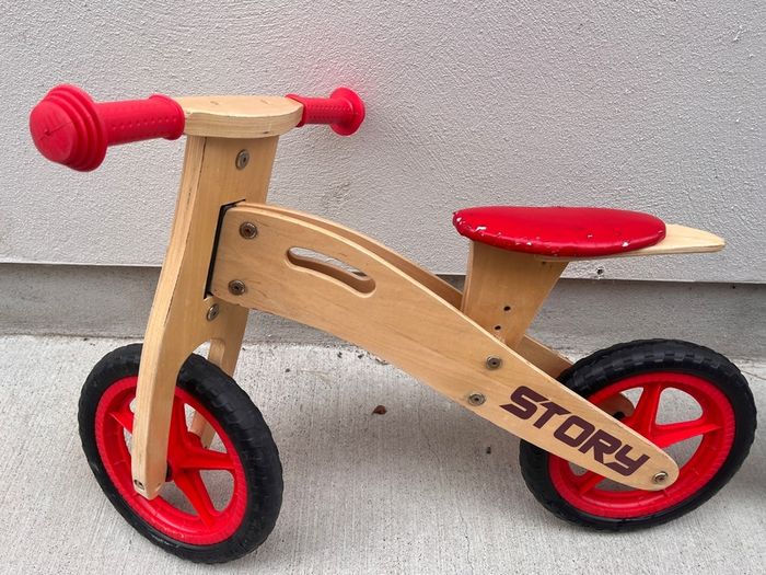 Story wooden balance bike