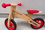 Story wooden balance bike