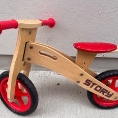 Story wooden balance bike