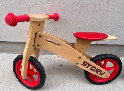 Story wooden balance bike
