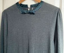 NAF NAF fine knit jumper dress in a rich dark green shade.