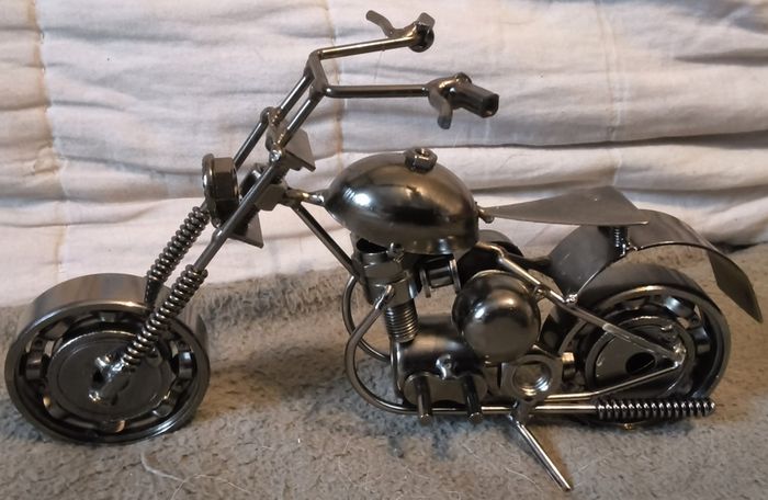 White metal made motor bike