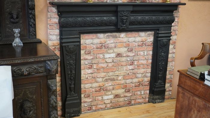 Ram-Head Wrought Iron Fireplace Surround with Timber Mantel