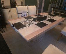 Marble table with 4 cream leather chairs