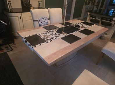 Marble table with 4 cream leather chairs