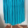Vintage 1980s turquoise blue pleated midi length skirt. Made in Ireland by Michel Ambers, size 12. Image 4