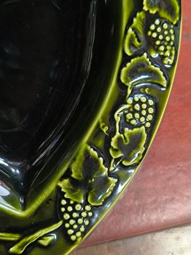 vintage Moet & Chandon shield-shaped ceramic advertising piece.