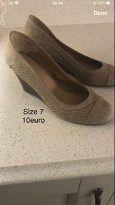 Size 7 wedge beige shoes.