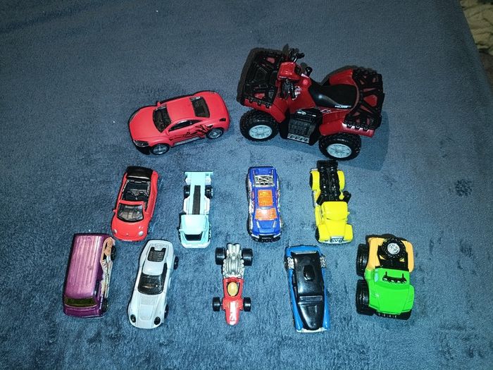 Bundle of assorted die-cast toy cars and quad bike