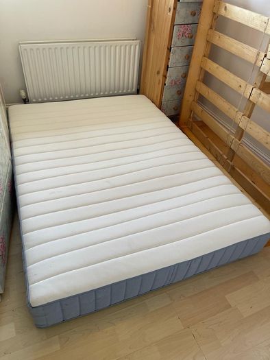 Double standard bed with baby bed barrier