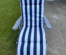 2 Sun loungers with navy and white cushion