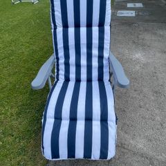 2 Sun loungers with navy and white cushion