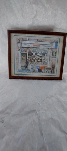 Old advertising shop front picture print ,different brands for sale, in the shop,nice for any home bar or man cave pub restaurant etc,,buyer collects thank you,, rather buyer collects with the glass ,sold as is ,,see pictures for condition