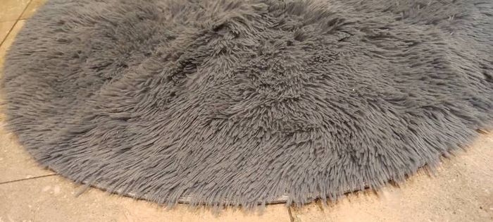 Grey round rug