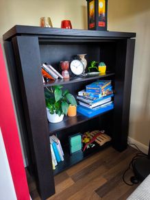 Bookcase shelving unit from black wood veneer