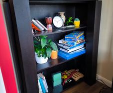 Bookcase shelving unit from black wood veneer